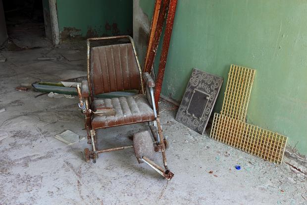 Ukraine. In the Restricted and Uninhabitable 30 Kilometer Zone Around the Chernobyl Power Plant and the Pripyat Labor Camp. Chair In the Hospital In Pripyat 