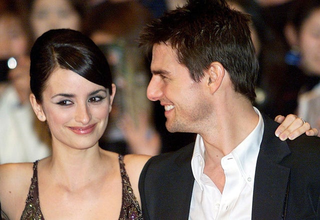 US movie star Tom Cruise (R) shares a smile with h 