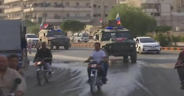 Russian troops moving into areas once controlled by US-backed Kurds