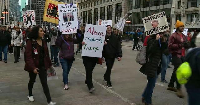 Angry crowds rally against Trump in Chicago