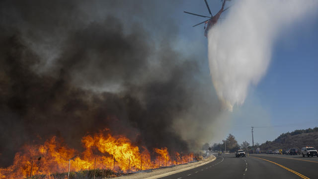 "Extreme" Santa Ana Winds Spark New Wildfires In Southern California 