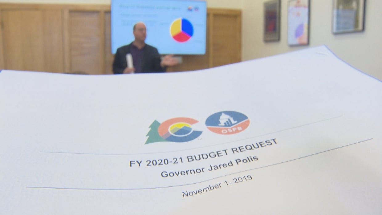 Gov Jared Polis Proposes Expanding Benefits To Keep State Employees 