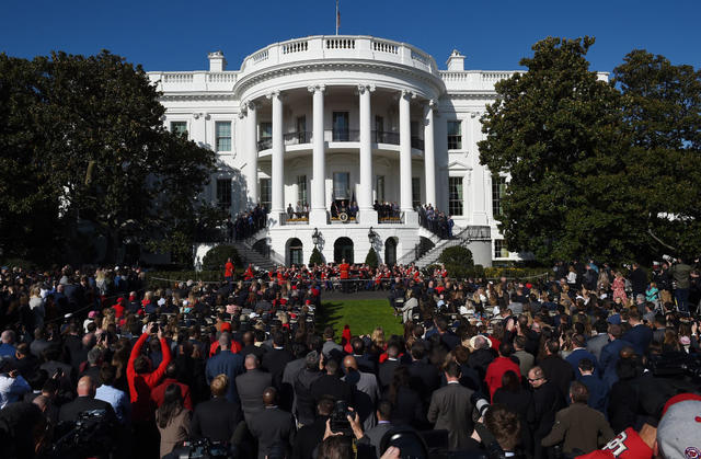 Washington, United States. 04th Nov, 2019. President Donald Trump smiles as  Washington Nationals player Kurt Suzuki wears a Make America Great Again  hat during a ceremony for the World Series Champions on