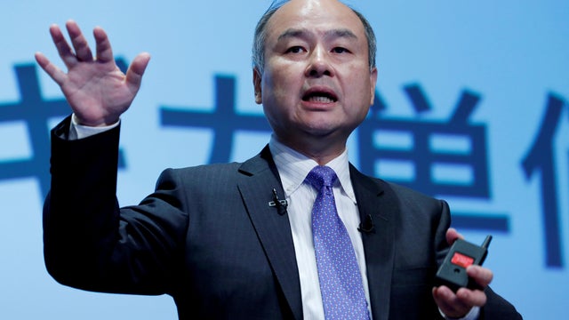 FILE PHOTO: Japan's SoftBank Group Corp Chief Executive Masayoshi Son attends a news conference in Tokyo, Japan 