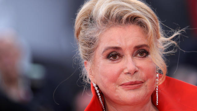 Catherine Deneuve walks the red carpet ahead of the opening ceremony and a screening of "La Vérité" (The Truth) during the 76th Venice Film Festival at Sala Grande on August 28, 2019, in Venice, Italy. 