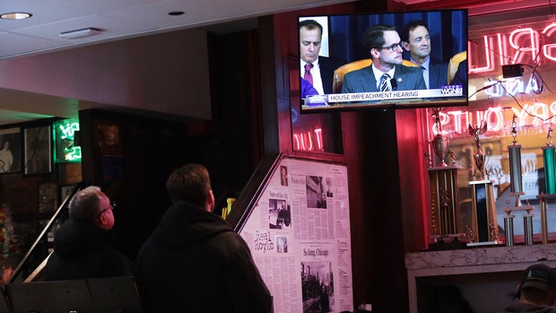 Americans Gather To Watch The First Open Hearing Of The Trump Impeachment Inquiry 