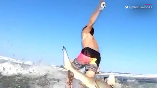 191202082248-shark-sideswipes-boy-on-surfboard-live-video.jpg 
