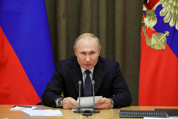 Russian President Vladimir Putin chairs a meeting with top officials of the Russian Defence Ministry in Sochi 