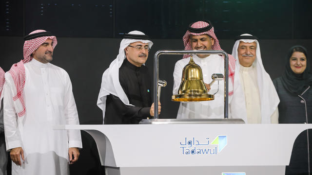 Amin H. Nasser, President and CEO of Aramco, rings the bell during the official ceremony marking the debut of Saudi Aramco's initial public offering (IPO) on the Riyadh's stock market, in Riyadh 