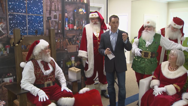 Mitch Allen and some hired Santas 
