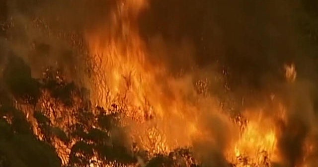 Australian sky turns apocalyptic red by raging wildfires