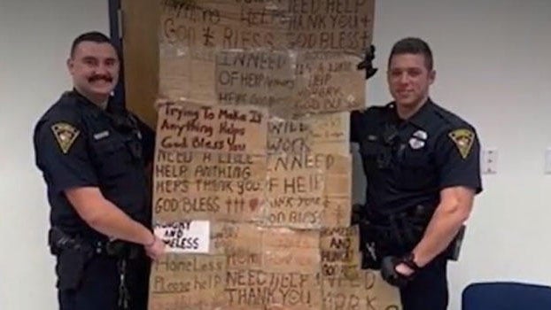 mobile-alabama-cops-homeless-signs-quilt-1219.jpg 