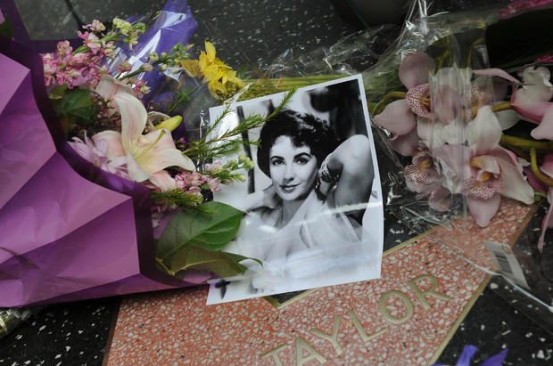 Flowers placed by fans on Elizabeth Tayl 