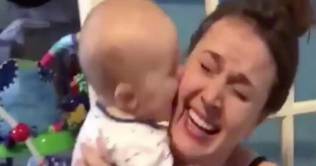 9 Month Old Baby Covers Mom In Kisses In Viral Video Cbs News