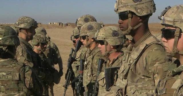 Trump threatens sanctions in Iraq after vote to expel U.S. troops
