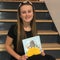 Teen daughter of murder victim writes children's book series