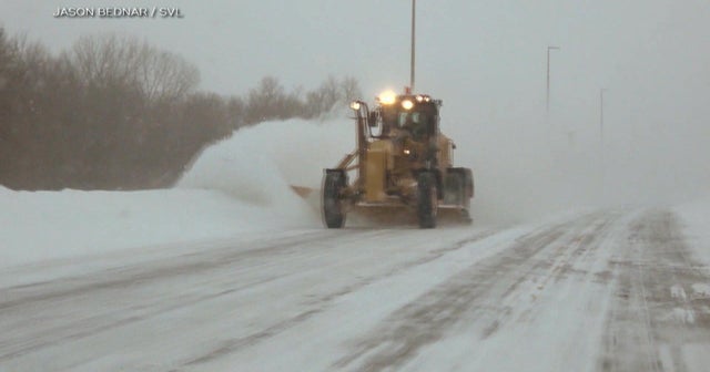 Minnesota hit with snow storm causing dangerous driving conditions , a third of the country facing weather alerts