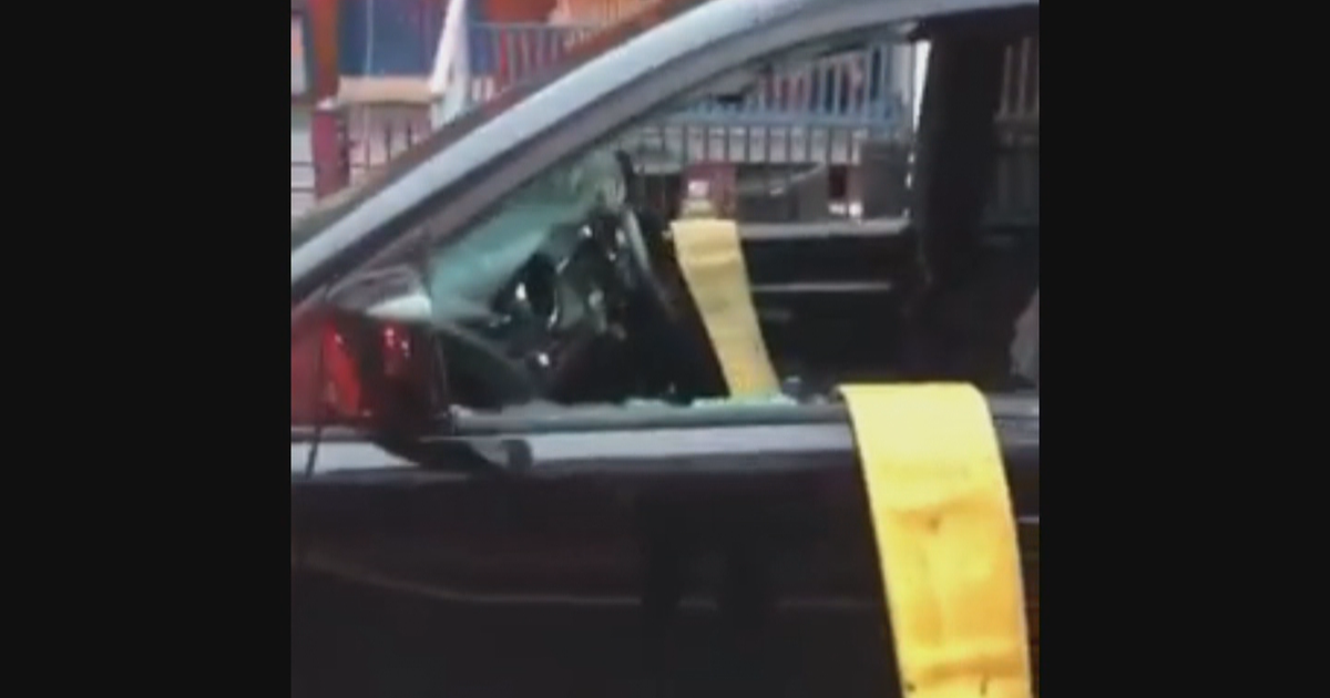 Firefighters Navigate Through Car Parked In Front Of Fire Hydrant To