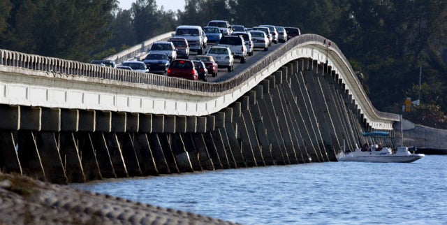 For Travel - 02/16/03 - As many as 12,000 cars a day cross the causeway from Ft. Myers to Sanibel Island. A 20 mph speedlimit guarantees a traffic jam and a trip of over an hour drivetime.