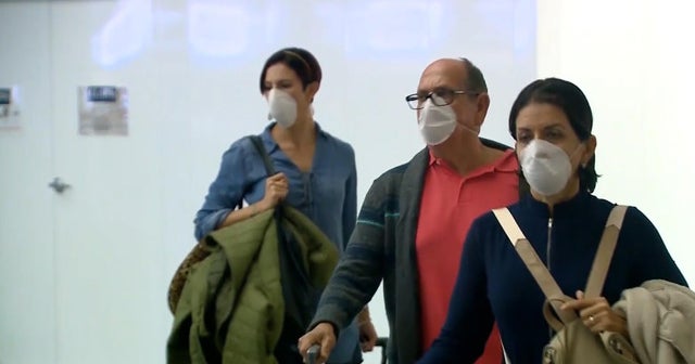 Do face masks really protect against coronavirus? - CBS News