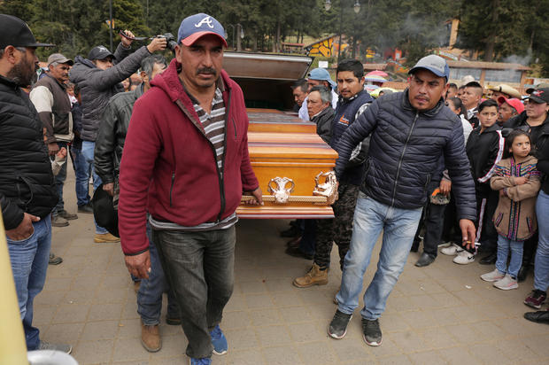 Relatives and friends carry the coffin of environmental activist Homero Gomez, during his funeral service in the western Mexican state of Michoacan 