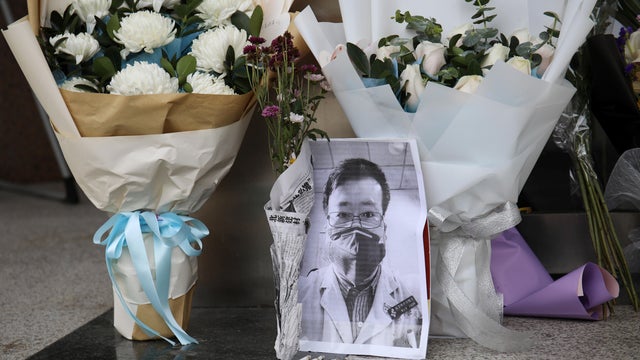 A makeshift memorial for Li Wenliang is seen at an entrance to the Central Hospital of Wuhan 