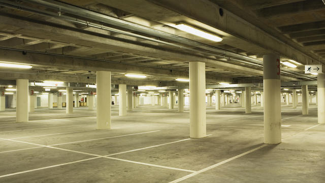 Empty illuminated underground carpark 