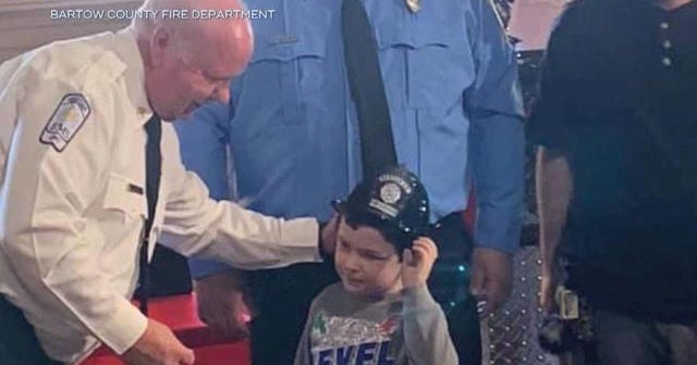 Boy who saved his family is honored by fire department - CBS News
