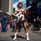The Naked Cowboy plays guitar in Times Square on April 9, 2014, in New York City. 