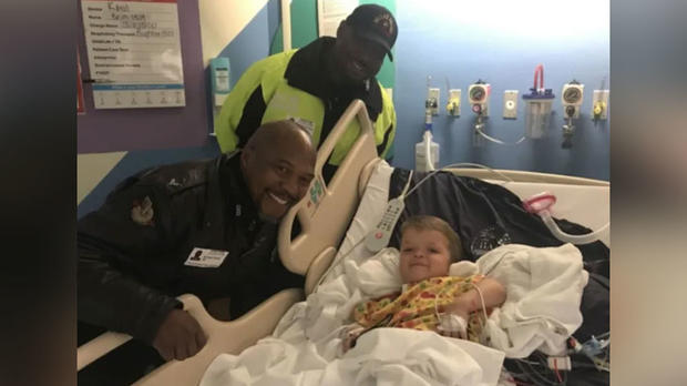 Dallas officers surprise sick child 