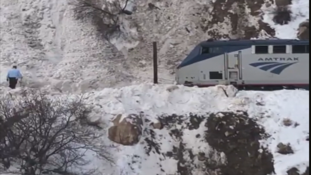 SNOW SLIDE ON TRAIN TRACKS 6NATVO.Consolidated.01_frame_377 