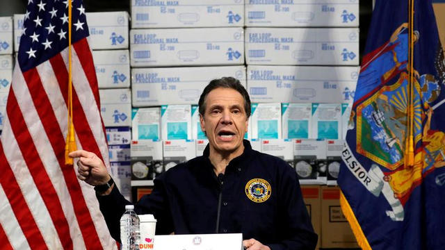 FILE PHOTO: New York Governor Andrew Cuomo speaks in front of stacks of medical protective supplies at a news conference at the Jacob K. Javits Convention Center which will be partially converted into a temporary hospital during the outbreak of the corona 