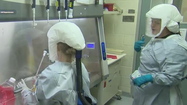 cbsn-fusion-military-scientists-working-with-coronavirus-samples-to-develop-possible-treatment-thumbnail-465352.jpg 
