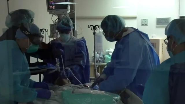 cbsn-fusion-new-york-hospitals-struggle-as-military-reinforcements-arrive-to-battle-coronavirus-thumbnail-466671.jpg 
