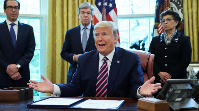 U.S. President Trump participates in coronavirus relief bill signing ceremony at the White House in Washington 