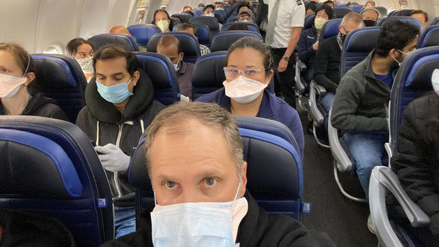 A United Airlines flight from Newark to San Francisco is crowded with passengers in this picture obtained from social media 