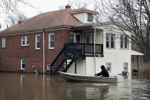 Rains And Snow Melt Lead To Major Flooding And Evacuations In Midwest 