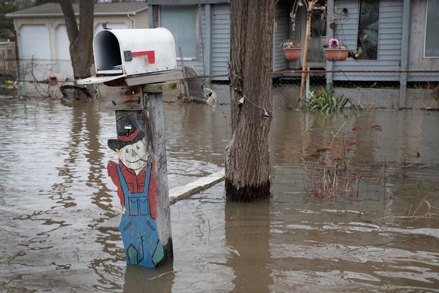 Rains And Snow Melt Lead To Major Flooding And Evacuations In Midwest 