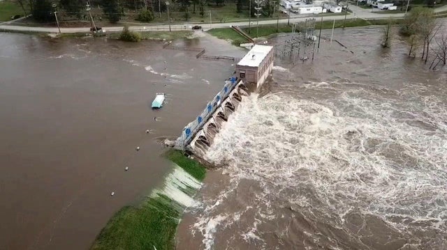 Water overruns Sanford Dam in Michigan on May 19, 2020, in this still frame obtained from social media video.