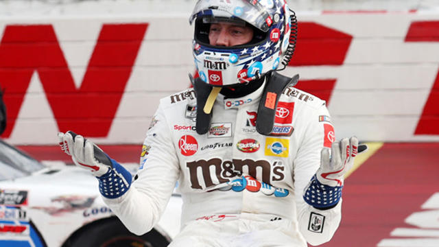 Kyle Busch, driver of the M&M's Fudge Brownie Toyota, pits during