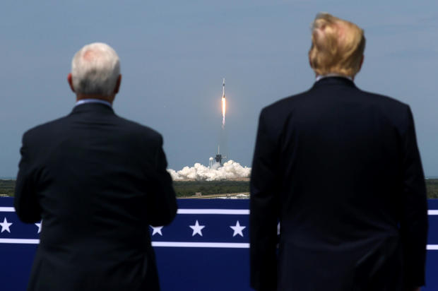 U.S. President Donald Trump and U.S. Vice President Mike Pence attend the launch of a SpaceX Falcon 9 rocket and Crew Dragon spacecraft, from Cape Canaveral, Florida, U.S. May 30, 2020. REUTERS/Jonathan Ernst 