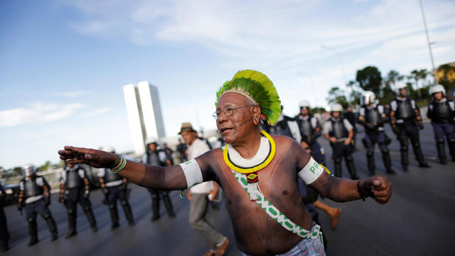 Indigenous leader Paulinho Paiakan of Kayapo tribe, takes part a protest against Brazil's president Michel Temer for the violation of indigenous people's rights, in Brasilia 