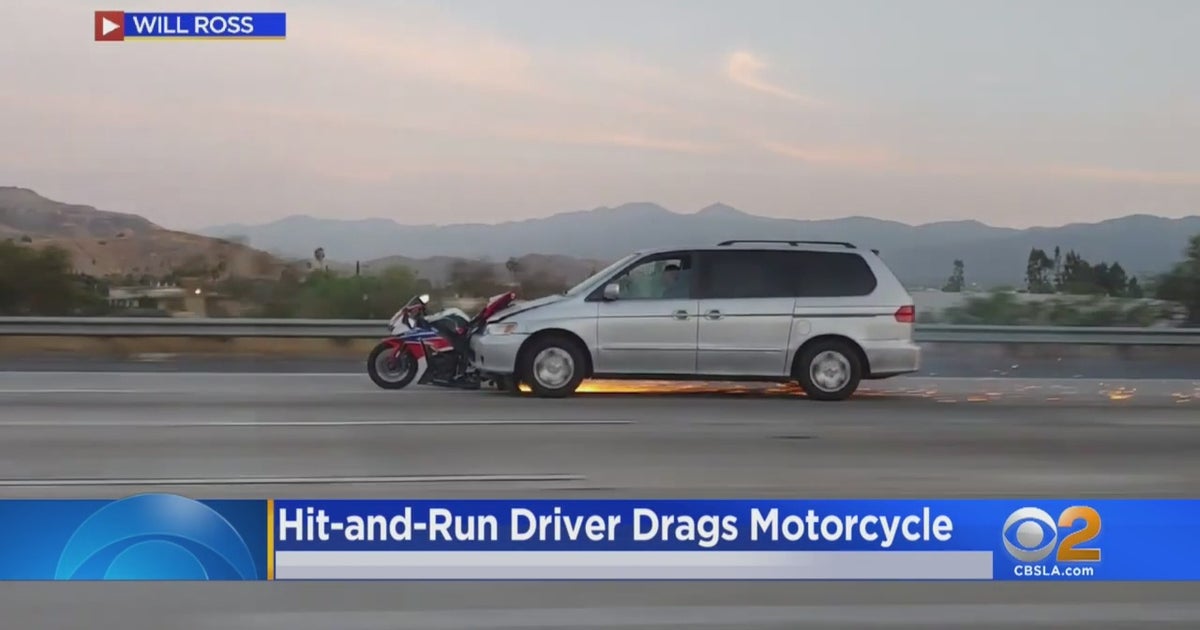 Caught On Camera: Video Shows Hit-And-Run Driver Speeding Down 91 Freeway In Corona With Motorcycle Wrapped Around Front Bumper - CBS Los Angeles