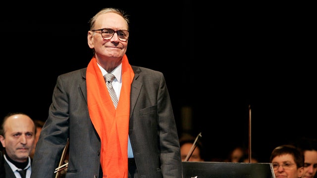 FILE PHOTO: Italian movie composer Morricone conducts the Sinfonietta orchestra during a Christmas concert in Milan 