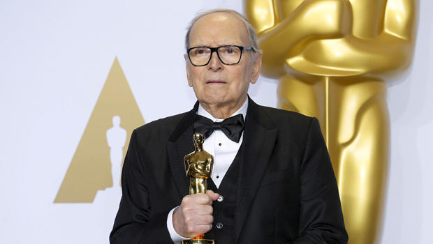 FILE PHOTO: Italian composer Ennio Morricone poses with his Oscar for Best Original Score for "The Hateful Eight," during the 88th Academy Awards in Hollywood 