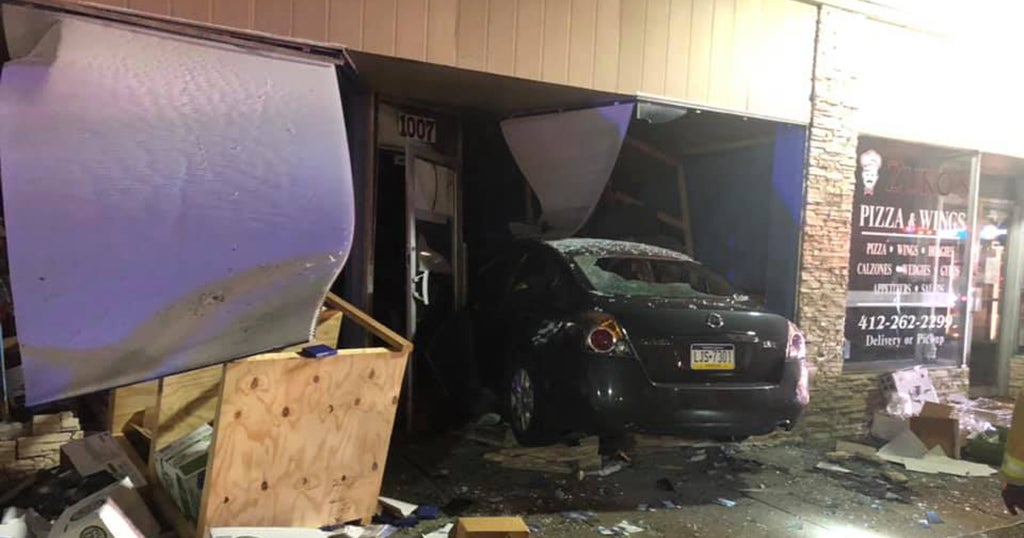 Two People Taken To The Hospital After Car Crashes Into Building In ...