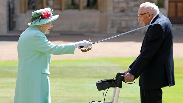 The Queen Confers The Honour Of Knighthood On Captain Sir Thomas Moore 