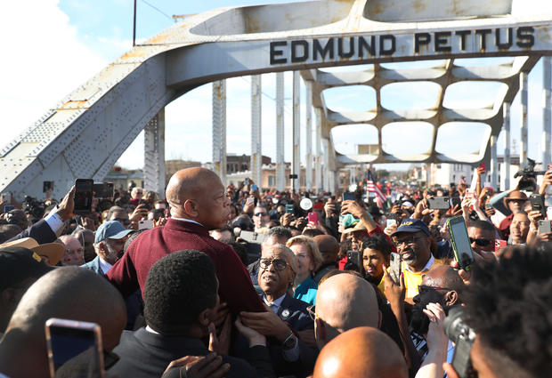 Presidential Democratic Candidates March Across Edmund Pettus Bridge Marking 55th Anniversary Of Selma's Bloody Sunday 