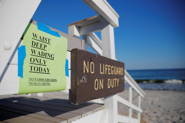 A sign announces that swimming is restricted to waist deep wading in Cape Elizabeth 