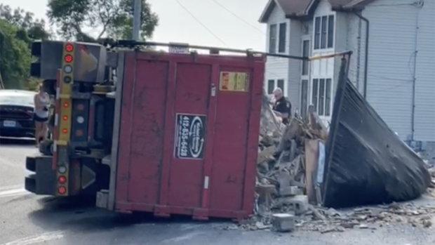 dump-garbage-truck-overturned-2 